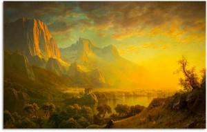 A golden sunset over a mountain landscape