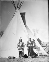 Buckskin Charlie & two Native American women