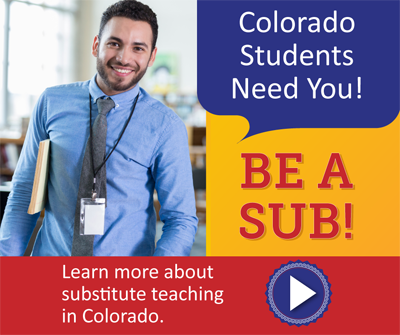 A young teacher dressed in a tie with text that says 