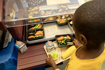 Image of student going through lunch line