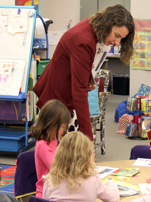 Photo of Commissioner Katy Anthes interacting with kindergartners at Fall River Elementary School in Longmont