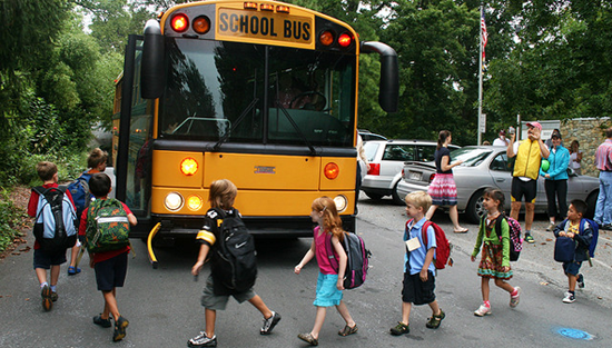 Children boarding a school bus