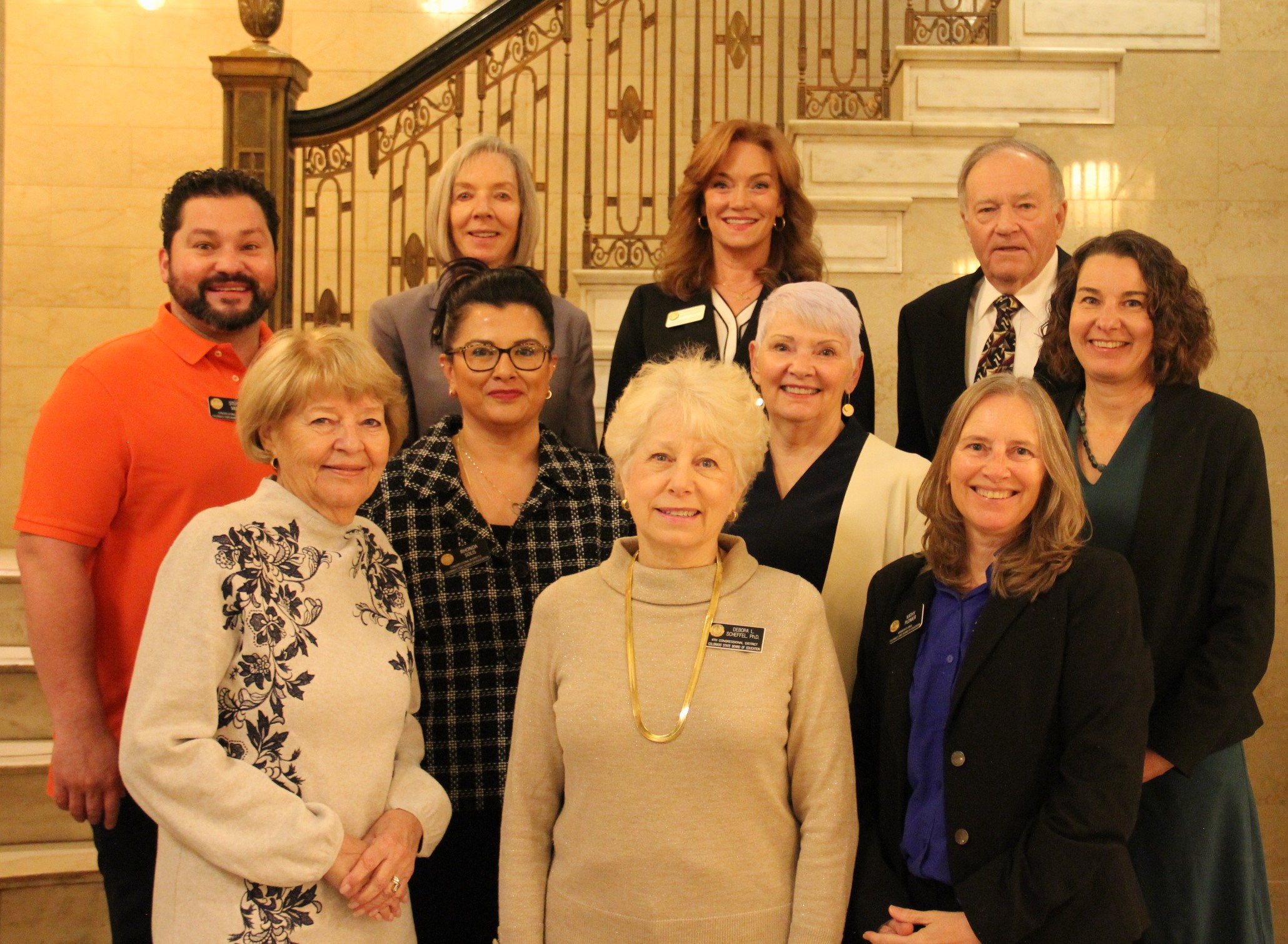 Group photo with State Board of Education members and Commissioner Katy Anthes. Taken in lobby of Colorado Department of Education 201 E Colfax building on Wednesday, March 8.