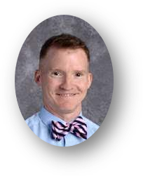 Dr. Joseph Smail wearing a dress shirt and bowtie