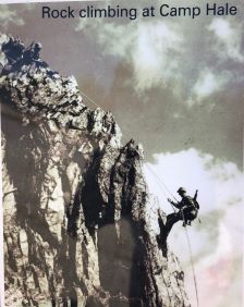 An old rock climber repelling at Camp Hale.