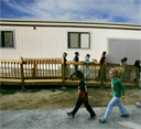 3rd grade students in Commerce City walk outside their classroom