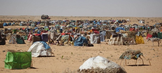 Internally Displaced Persons camp where foreign aid organizations attempt to distribute resources