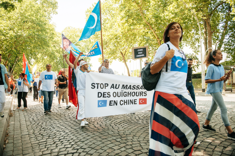Strasbourg, France - July 11, 2015: Uyghur human rights activists participate in a demonstration to protest against Chinese government's policy in Uyghur